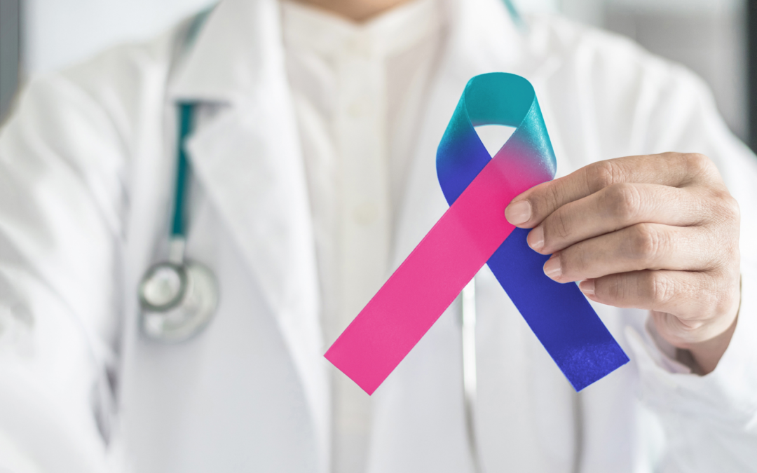 Doctor holding cancer ribbon