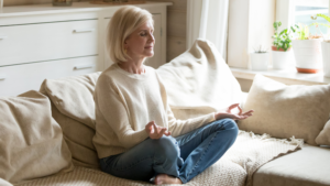 Woman meditating for mental wellness