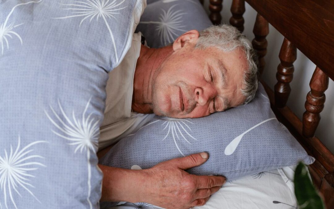 Older adult sleeping peacefully in a comfortable bedroom for healthy sleep